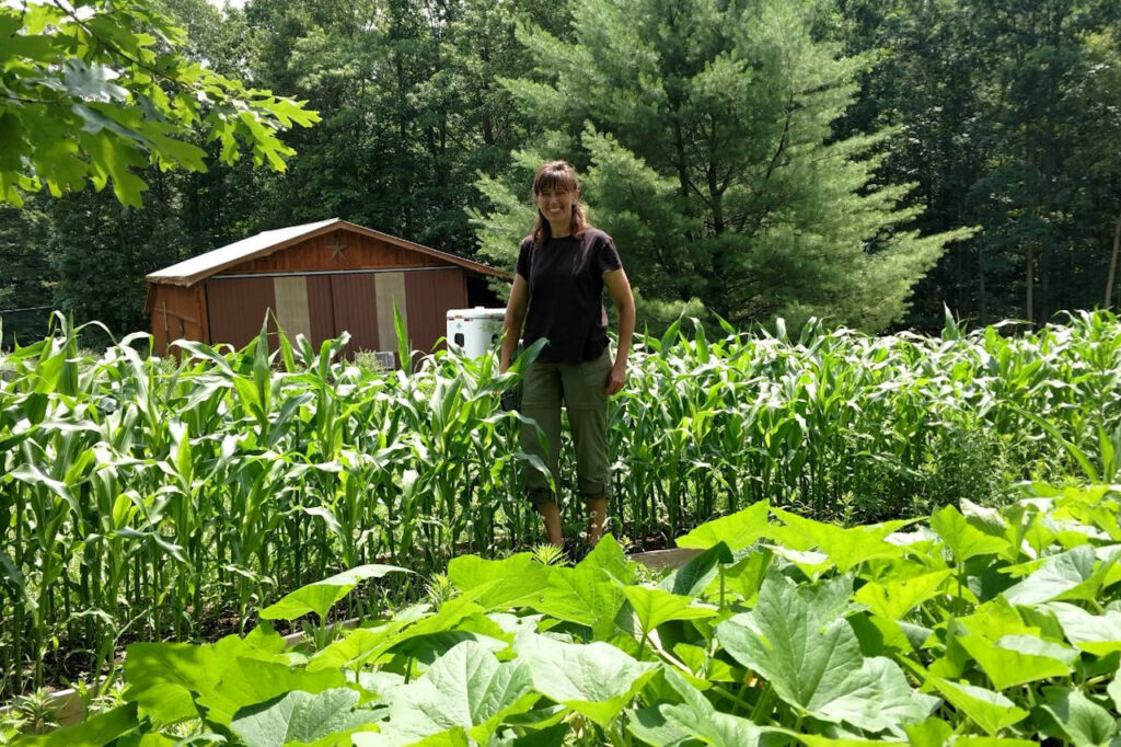 bren in garden Bren standing in the homestead vegetable garden.